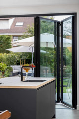 Luxe serreaanbouw met brede vouwwand-Busscher Serrebouw-Aanbouw-OBLY