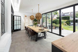 Luxe serreaanbouw met brede vouwwand-Busscher Serrebouw-Aanbouw-OBLY