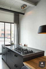 Luxueus en industrieel interieurontwerp-Grego Design Studio-alle,donkere keuken inspiratie,industriële luxe woning,industriële woonkamer,luxe industrieel interieur,luxe wooninrichting,maatwerk interieur zwart,moderne haardwand,stijlvolle loft uitstraling,Woonkamer,zwart interieurdesign-Luxe, industrieel interieurontwerp | OBLY.com-OBLY