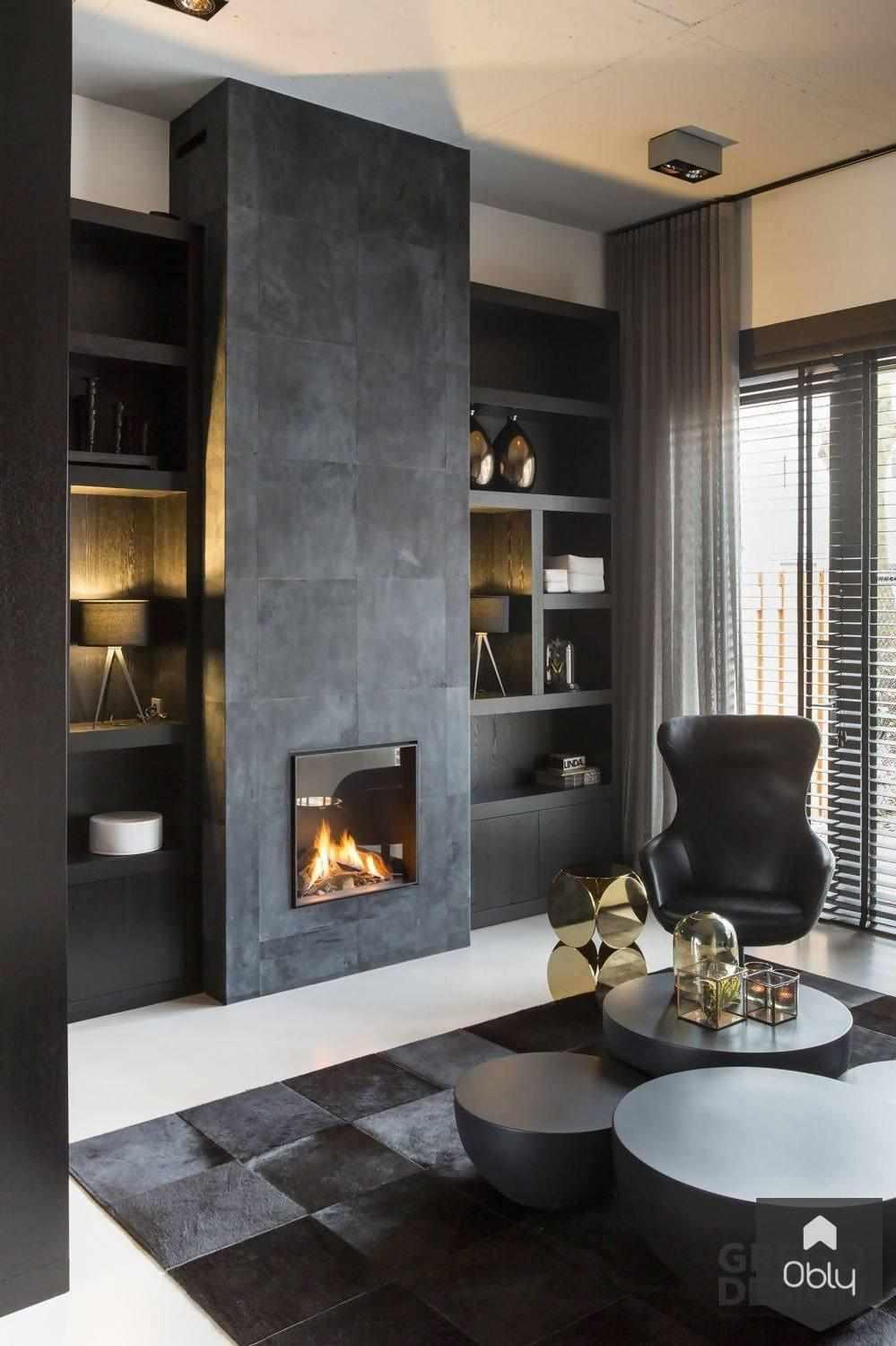 Luxueus en industrieel interieurontwerp-Grego Design Studio-alle,donkere keuken inspiratie,industriële luxe woning,industriële woonkamer,luxe industrieel interieur,luxe wooninrichting,maatwerk interieur zwart,moderne haardwand,stijlvolle loft uitstraling,Woonkamer,zwart interieurdesign-Luxe, industrieel interieurontwerp | OBLY.com-OBLY