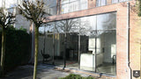 Minimalistische stalen pui in jaren 20 woning-DdP-Architectuur-alle,Keuken,keuken met lichtinval,lichte woonkamer,moderne keuken,open keuken woonkamer,woonkamer met veel licht-OBLY