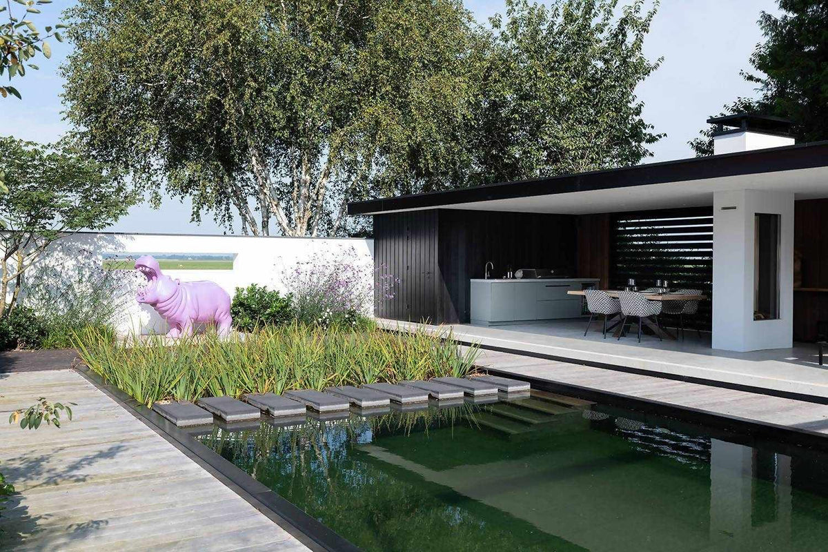 Moderne design buitenkeuken-COOXS-buitenkeuken met betonlook werkblad,design tuin met buitenverblijf,exclusieve wellness tuin,luxe buitenkeuken inspiratie,minimalistische buitenruimte,moderne buitenkeuken met barbecue,moderne design buitenkeuken,strakke tuinarchitectuur-Moderne cooxs design buitenkeuken -OBLY