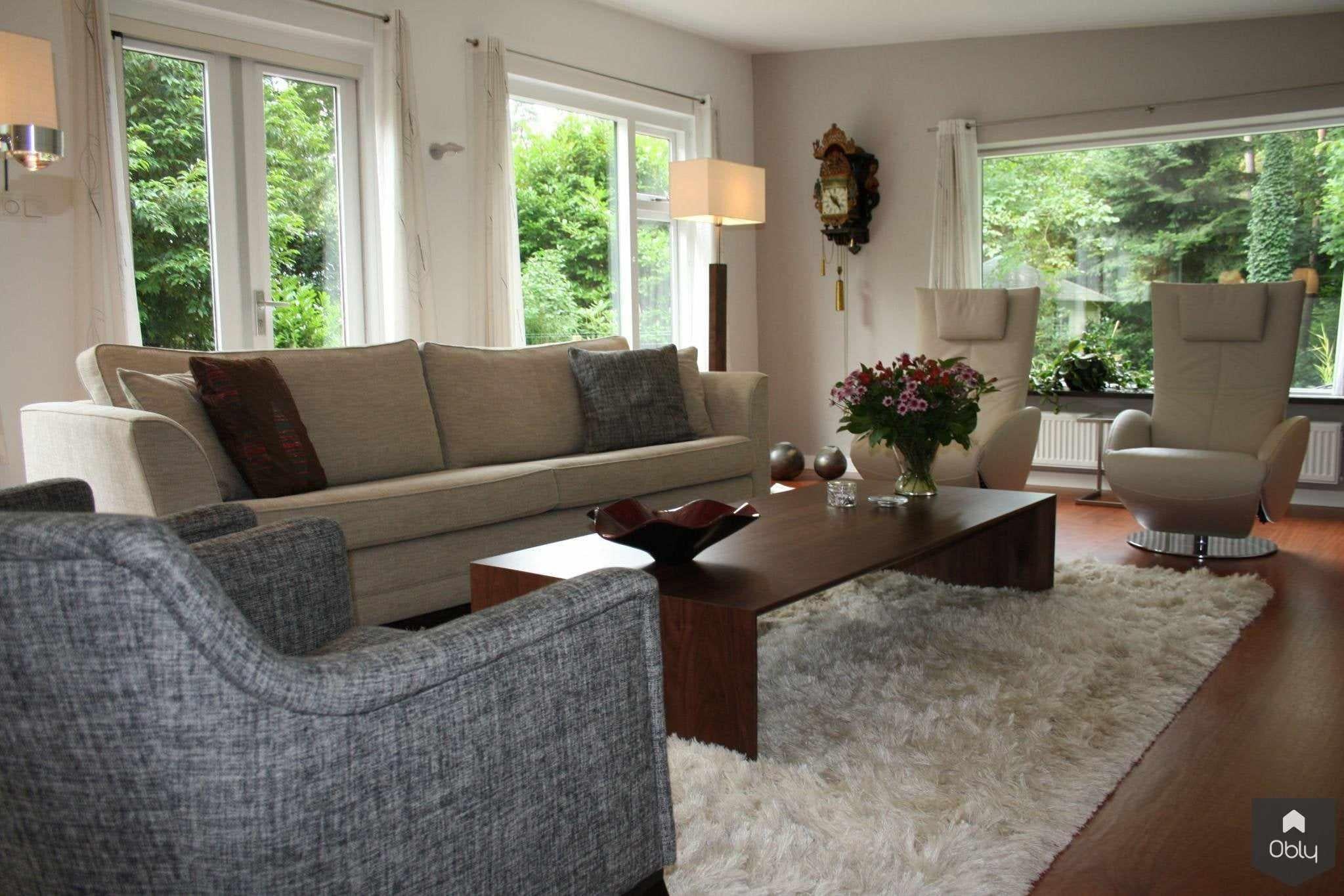 Moderne en strakke woonkamer met comfort en warmte-Verstappen Interiors | House of JAB-alle,modern interieur,moderne woonkamer,strak interieur ontwerp,warme woonkamer inrichting,Woonkamer-OBLY
