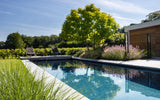 Moderne tuin met zwembad in het landschap-Stoop Tuinen-tuin-Moderne tuin met zwembad in het Brabants landschap-OBLY