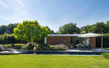Moderne tuin met zwembad in het landschap-Stoop Tuinen-tuin-Moderne tuin met zwembad in het Brabants landschap-OBLY