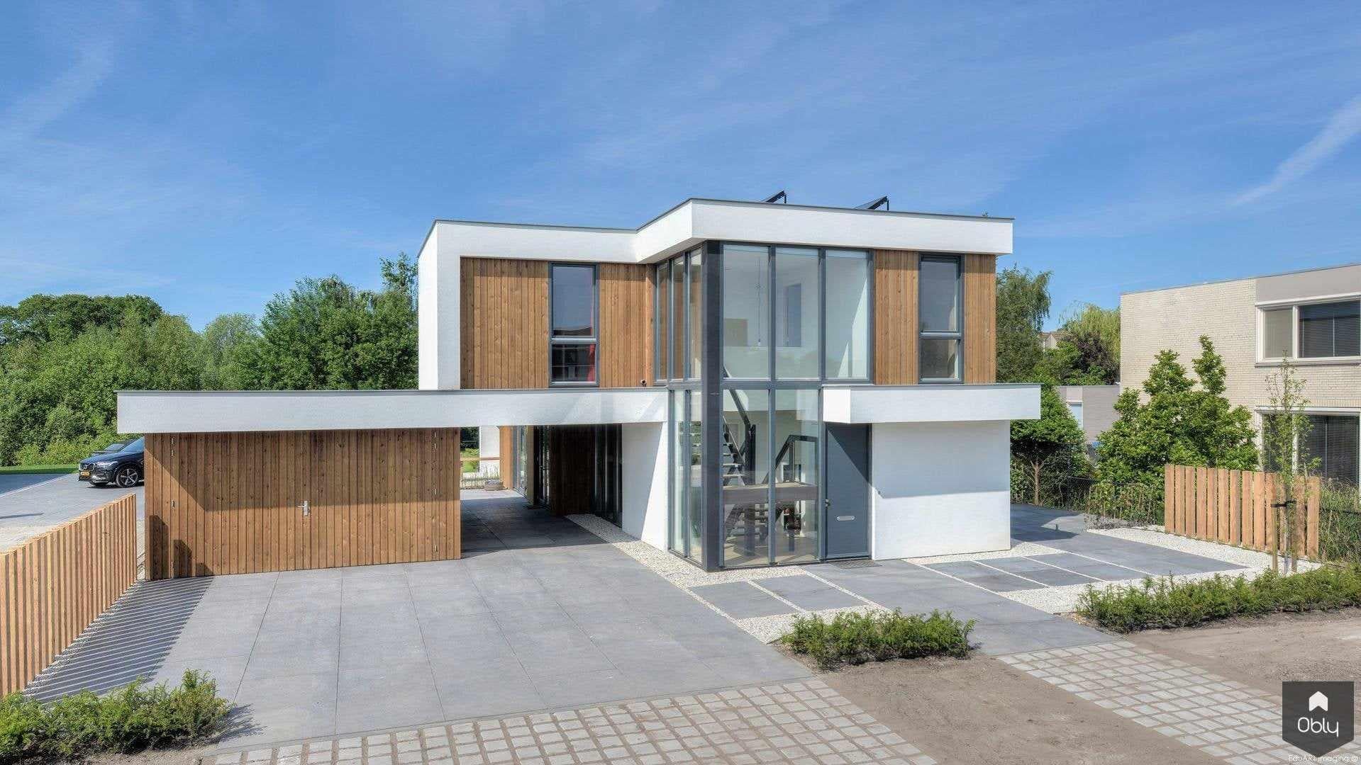 Moderne villa met stucwerk en houten geveldelen-lab-R architectenbureau-alle,Exterieur vrijstaand,luxe villa,moderne villa,moderne woning,villa architectuur,villa exterieur,villa ontwerp-OBLY