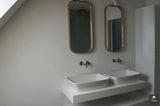 Natuurlijke warme badkamer-Fors design badkamers-alle,Badkamer,badkamer met aardetinten,badkamer met betonlook en hout,badkamer met zachte verlichting,minimalistische warme badkamer,moderne badkamer met natuurlijke materialen,natuurlijke badkamer inspiratie,organische badkamer stijl,rustige spa badkamer thuis,warme badkamer met houtlook-Warme badkamer met natuurlijke materialen | Fors Design-OBLY