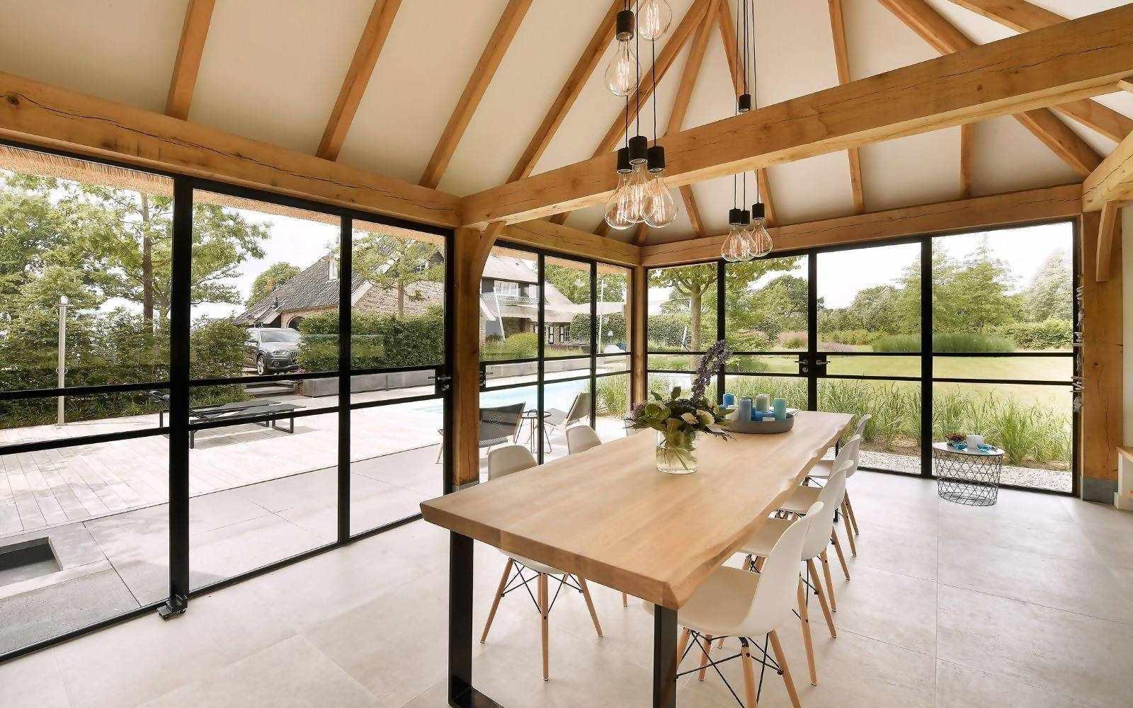 Prestigieus poolhouse met stalen buitendeuren-Stalendeurenhuys-alle,exclusieve tuinarchitectuur,glazen gevels,luxe buitenverblijf,minimalistische staalprofielen,poolhouse met glas,prestigieus poolhouse,stalen buitendeuren,stalen pui op maat,Woonkamer-OBLY