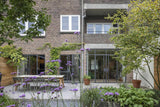 Samenvoeging beneden- en bovenwoning-Nest-DubbelWonen,InterneDoorbraak,LichtInterieur,ModerneKeuken,OpenIndeling,SamenvoegingWoningen,Woonkamer-Samenvoeging beneden- en bovenwoning-OBLY