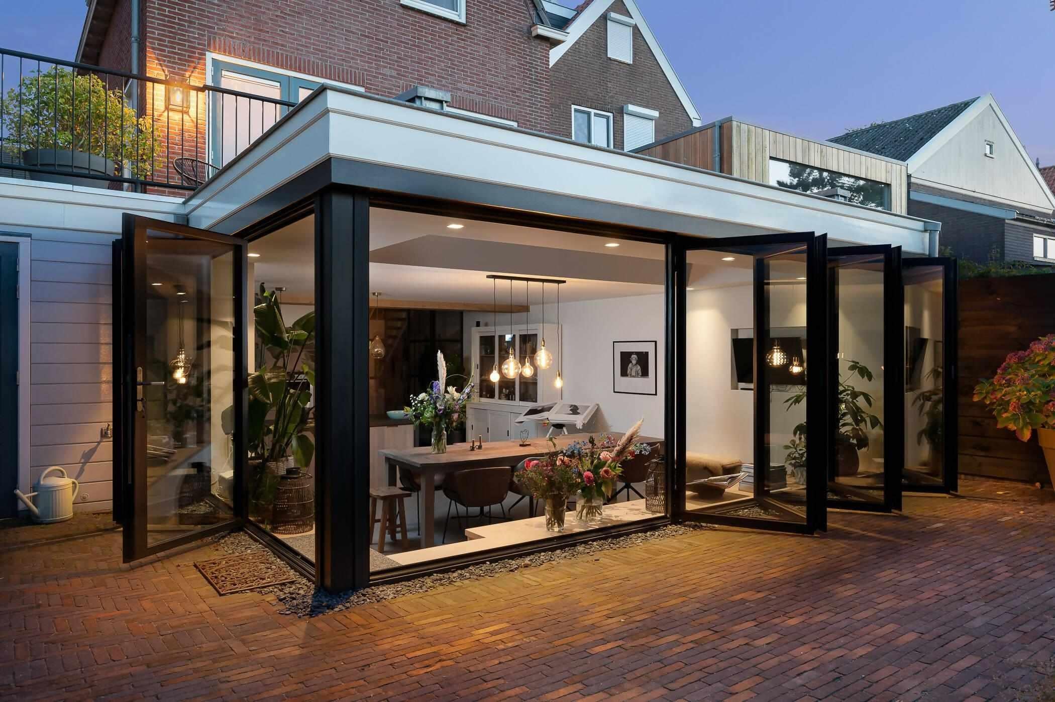 Serre op een souterrain-Busscher Serrebouw-Aanbouw,glazen serre,moderne serre woning,serre aanbouw,serre met lichtstraat,serre met schuifpuien-Serre op een souterrain-OBLY