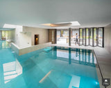 Solarlux glazen vouwwand bij zwembad-Solarlux Nederland BV-Aanbouw,alle-OBLY