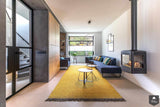 Stadse jaren ’50 hoekwoning met allure van moderne villa-StrandNL architectuur en interieur-alle,Woonkamer-OBLY