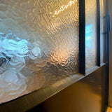 Stalen deur met kathedraal glas-Stalendeurenhuys-woonkamer-Stalen taatsdeur met kathedraal glas-OBLY