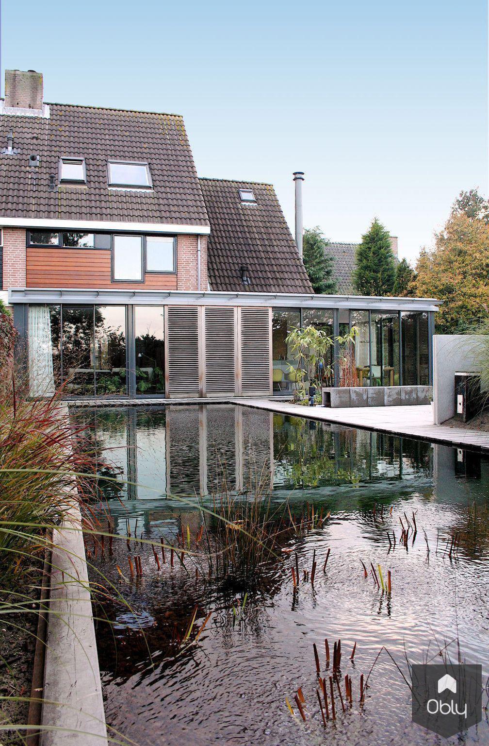 Uitbouw woonhuis Vogelenzang-Paul Seuntjens Architectuur + Interieur-Aanbouw,alle,Exterieur,jaren 70 woning,schuifpuien,uitbouw,vijver,zonoriëntatie-OBLY
