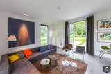 Villa Heemstede - woonkamer-Paul Seuntjens Architectuur + Interieur-alle,moderne villa,open leefruimte,open verbinding,ruimtelijk ontwerp,tv-hoek,Woonkamer,zithoek-OBLY
