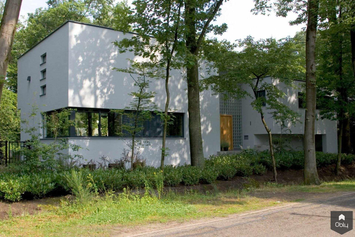 Villa met verbinding met natuur-Doreth Eijkens | Interieur Architectuur-alle,bosrijke villa inrichting,luxe villa interieur,maatwerk boekenkast,maatwerk interieurdesign,maatwerk keuken,moderne villa architectuur,verbinding binnen buiten,villa in natuur,warme natuurlijke materialen,Woonkamer-OBLY