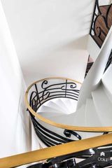 Wenteltrap met siersmeedwerk-Van Bruchem Staircases-alle,Entree hal trap-OBLY