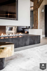 Woonkamer met vrijstaande haard in Villa-LTD Studio-alle,Woonkamer-OBLY