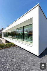 Zwarte schuifpui bij moderne villa-KELLER minimal windows® by Kumasol-alle,Exterieur vrijstaand,Vrijstaand-Zwarte schuifpui bij moderne villa | OBLY.com-OBLY