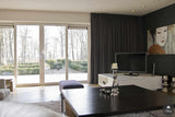 grote zithoek in landelijke omgeving-Doret Schulkes Interieurarchitect-alle,comfortabele leefruimte,dubbele deuren interieur,grote woonkamer,landelijke woonkamer,luxe zithoek,moderne landelijke inrichting,stijlvolle woonkeuken,warme interieurstijl,Woonkamer-OBLY