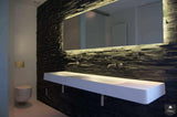 stoere minimalistische badkamer-Fors design badkamers-alle,Badkamer,badkamer met inbouwkranen,badkamer met natuursteen wand,badkamer met sfeerverlichting,industriële badkamer stijl,luxe badkamer met vrijstaand bad,minimalistische badkamer met warme verlichting,moderne badkamer met betonlook,stoere minimalistische badkamer,strakke design badkamer donker-Stoere minimalistische badkamer met vrijstaand bad-OBLY