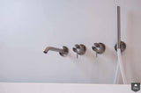 stoere minimalistische badkamer-Fors design badkamers-alle,Badkamer,badkamer met inbouwkranen,badkamer met natuursteen wand,badkamer met sfeerverlichting,industriële badkamer stijl,luxe badkamer met vrijstaand bad,minimalistische badkamer met warme verlichting,moderne badkamer met betonlook,stoere minimalistische badkamer,strakke design badkamer donker-Stoere minimalistische badkamer met vrijstaand bad-OBLY