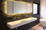 stoere minimalistische badkamer-Fors design badkamers-alle,Badkamer,badkamer met inbouwkranen,badkamer met natuursteen wand,badkamer met sfeerverlichting,industriële badkamer stijl,luxe badkamer met vrijstaand bad,minimalistische badkamer met warme verlichting,moderne badkamer met betonlook,stoere minimalistische badkamer,strakke design badkamer donker-Stoere minimalistische badkamer met vrijstaand bad-OBLY