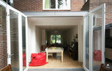 vouwpui-Jan Couwenberg Architectuur-Aanbouw,alle,glazen vouwpui tuin,grote vouwpui glaswand,moderne vouwpui woning,vouwpui aanbouw woning,vouwpui binnen buiten verbinding,vouwpui woonkamer tuin,woning met vouwpui achtergevel-OBLY
