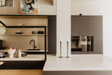 Luxe loft in oude textielfabriek met maatwerk keuken en designtrap