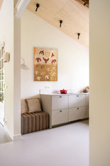 Warm familiehuis met natuurlijk interieur en doordacht lichtplan