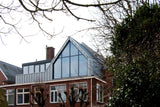 Grote dakopbouw in Den Haag aan de Nieuwe Parklaan-Sensbouw-dakopbouw,glazen gevel,maatwerk bouw,moderne architectuur,renovatie,woning uitbreiding,zakelijk-Moderne dakopbouw met glazen gevel-OBLY