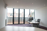Grote dakopbouw in Den Haag aan de Nieuwe Parklaan-Sensbouw-dakopbouw,glazen gevel,maatwerk bouw,moderne architectuur,renovatie,woning uitbreiding,zakelijk-Moderne dakopbouw met glazen gevel-OBLY
