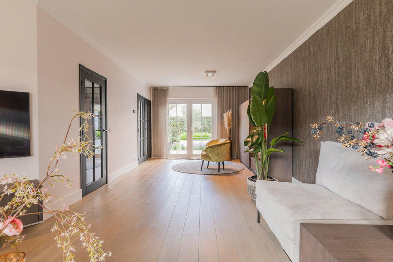 Harmonieuze Woonkamer met Warmte en Karakter-Bureau Kemps Architecten-woonkamer-Woonkamer Make-over: Warmte, Rust en Karakter | Interieur-OBLY