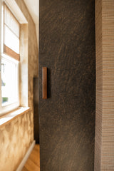 Warm familiehuis met maatwerk interieur van massief hout