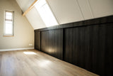Warm familiehuis met maatwerk interieur van massief hout