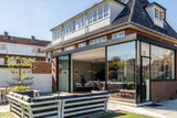 Jaren 30 woning met moderne aanbouw en luxe interieur