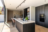 Jaren 30 woning met moderne aanbouw en luxe interieur