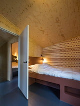 Knus houten huis verscholen in het bos-Brandvries-boshuis,Exterieur vrijstaand,houten woning,keuken,moderne architectuur,natuur-Boshuis Burcht – Uniek vakantiehuis op Vlieland -OBLY