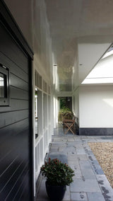 Landelijke woning met veranda-Bosmaat-Aanbouw,Buitenleven,houten veranda,overdekt terras,Tuinontwerp,veranda-Landelijke woning met veranda | Buitenleven-OBLY