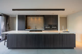 Luxe villa met maatwerk interieur-Oudendorp-badkamermeubel,Donkere keuken,Interieur inspiratie,Keuken op maat,Kookeiland,luxe badkamer,luxe villa,Maatwerk interieur,moderne keuken,moderne villa,Natuursteen,visgraatvloer,vrijstaand ligbad,wellness badkamer,wijnklimaatkast-OBLY