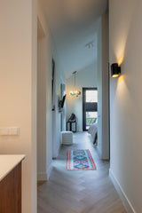 Luxe villa met maatwerk interieur-Oudendorp-badkamermeubel,Donkere keuken,Interieur inspiratie,Keuken op maat,Kookeiland,luxe badkamer,luxe villa,Maatwerk interieur,moderne keuken,moderne villa,Natuursteen,visgraatvloer,vrijstaand ligbad,wellness badkamer,wijnklimaatkast-OBLY