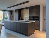 Luxe villa met maatwerk interieur-Oudendorp-badkamermeubel,Donkere keuken,Interieur inspiratie,Keuken op maat,Kookeiland,luxe badkamer,luxe villa,Maatwerk interieur,moderne keuken,moderne villa,Natuursteen,visgraatvloer,vrijstaand ligbad,wellness badkamer,wijnklimaatkast-OBLY