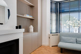 Maatwerk interieur met houten lattenwand en haard-studio stylez-design-interieur,eiken-vloer,haardombouw,houtaccenten,houten-lattenwand,interieur-op-maat,lattenwand,maatwerk-interieur,maatwerk-kastenwand,moderne-woning,visgraat-vloer,Woonkamer-Maatwerk interieur met houten lattenwand-OBLY