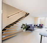 Minimalistische maatwerk keuken met stalen taatsdeur en zwevende trap-OBLY-design keuken,eiken trap,Greeploze keuken,iemms,Interieur inspiratie,Keuken,koffiecorner,Kookeiland,Maatwerk interieur,maatwerk keuken,moderne keuken,stalen taatsdeur,zwevende trap-Complete woningrenovatie met maatwerk keuken | Oudendorp-OBLY