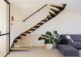Minimalistische maatwerk keuken met stalen taatsdeur en zwevende trap-OBLY-design keuken,eiken trap,Greeploze keuken,iemms,Interieur inspiratie,Keuken,koffiecorner,Kookeiland,Maatwerk interieur,maatwerk keuken,moderne keuken,stalen taatsdeur,zwevende trap-Complete woningrenovatie met maatwerk keuken | Oudendorp-OBLY
