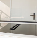 Minimalistische maatwerk keuken met stalen taatsdeur en zwevende trap-OBLY-design keuken,eiken trap,Greeploze keuken,iemms,Interieur inspiratie,Keuken,koffiecorner,Kookeiland,Maatwerk interieur,maatwerk keuken,moderne keuken,stalen taatsdeur,zwevende trap-Complete woningrenovatie met maatwerk keuken | Oudendorp-OBLY