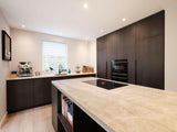 Modern Wonen met Natuurlijke Elementen-Anselm Oome Interieurbouw-design verlichting,Houtlook,houtlook keuken.,Keuken,keukens,moderne keuken,natuursteen werkblad,open leefruimte,Tajmahal,Woonkamer-OBLY
