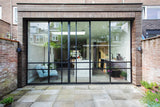 Moderne aanbouw jaren 30 woning met stalen pui-JAREN 30 ARCHITECT-bamboe gevelbekleding,duurzame uitbreiding,leefkeuken,renovatie woning,stalen pui-Jaren 30 woning met bamboe aanbouw-OBLY