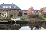 Moderne aanbouw met luxe woonkeuken aan het water-Goes serres-aanbouw inspiratie,aanbouw woonkeuken,aluminium kozijnen,glazen pui,luxe keuken,maatwerk keuken,moderne aanbouw,moderne woning,uitbouw,woonkeuken-Moderne aanbouw met woonkeuken | Goes Serres-OBLY