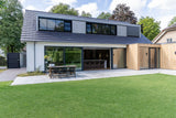 Moderne gezinswoning met open indeling-Bureau Kemps Architecten-woonkamer-Radicale openheid en verbonden leefruimtes in een familiewoning-OBLY